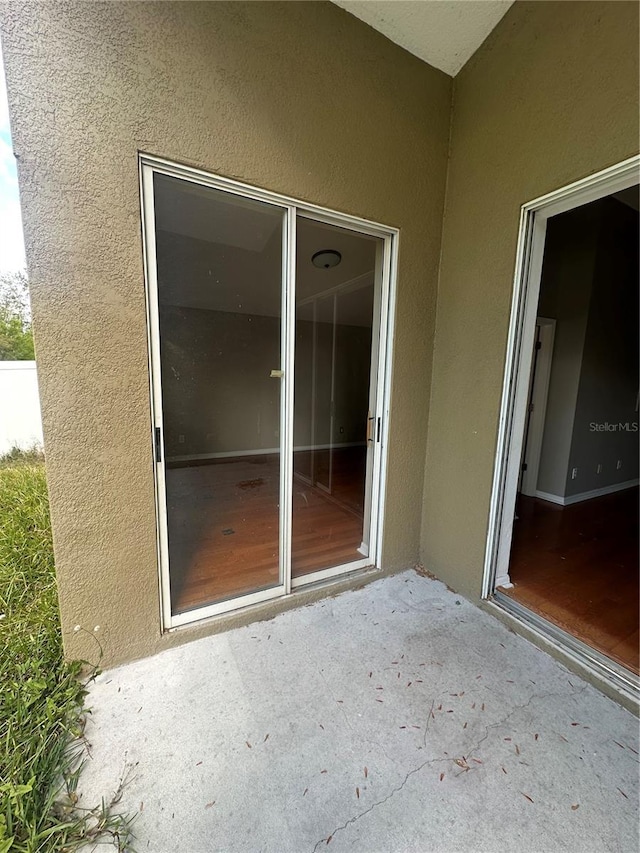 exterior space featuring stucco siding