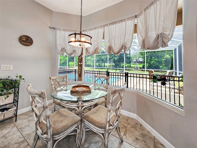 dining room featuring a chandelier