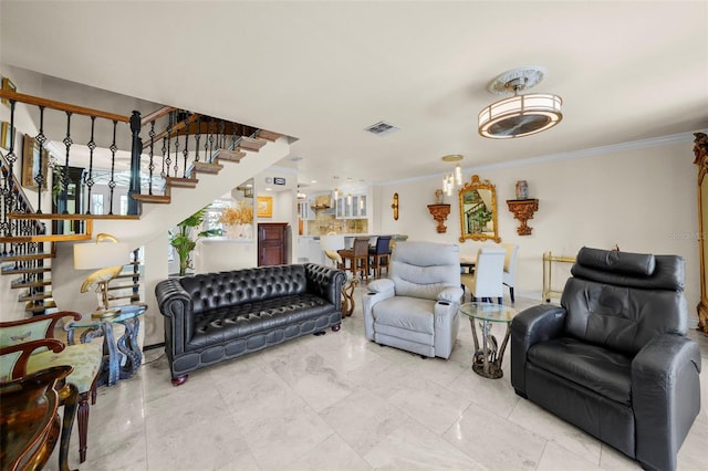 living room with visible vents, stairs, and crown molding