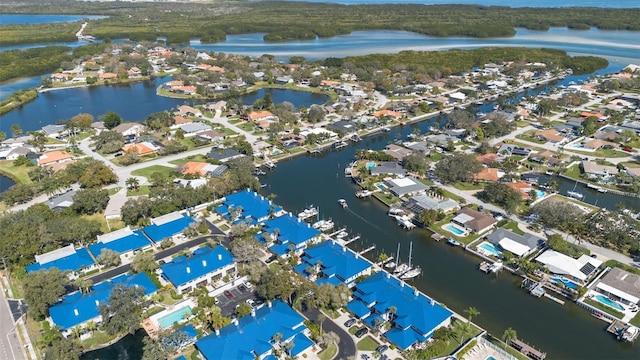 bird's eye view featuring a residential view and a water view