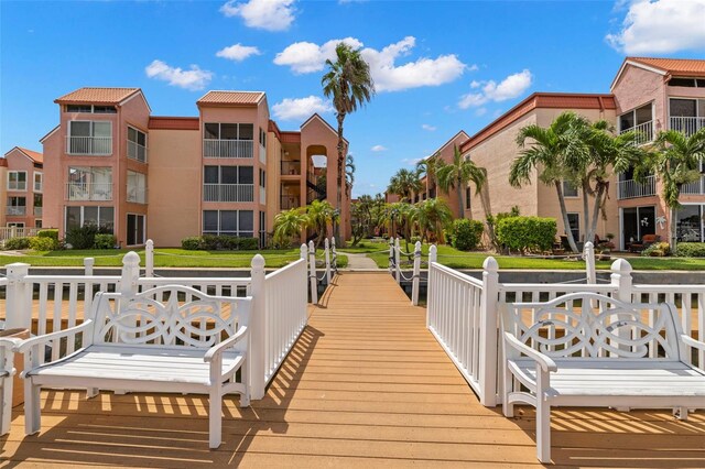 view of dock featuring a balcony