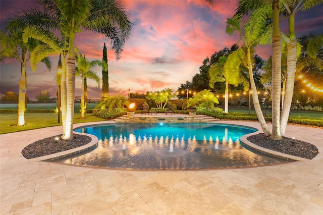 pool with a patio area