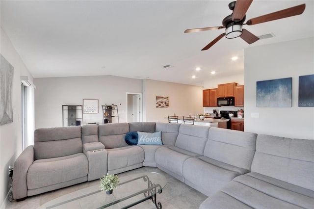 tiled living room with vaulted ceiling and ceiling fan