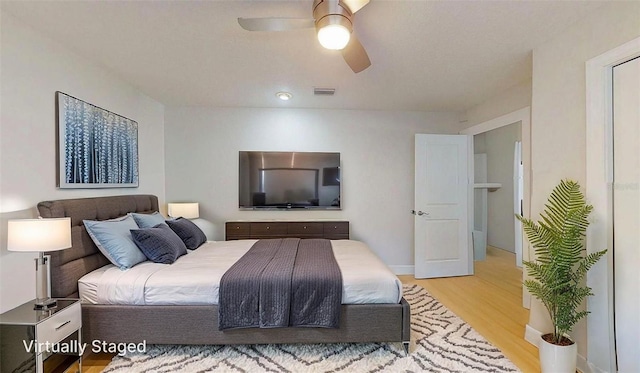 411 Harbor View Ln, Largo, FL 33770 - bedroom featuring light wood-type flooring and ceiling fan
