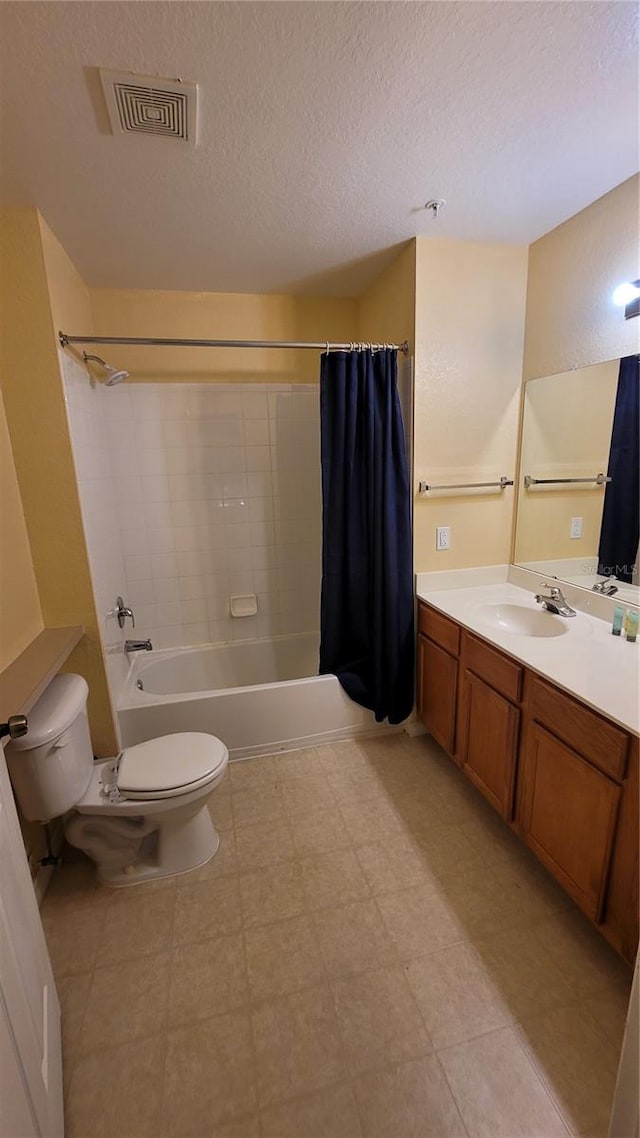 full bathroom with a textured ceiling, vanity, toilet, and shower / tub combo with curtain