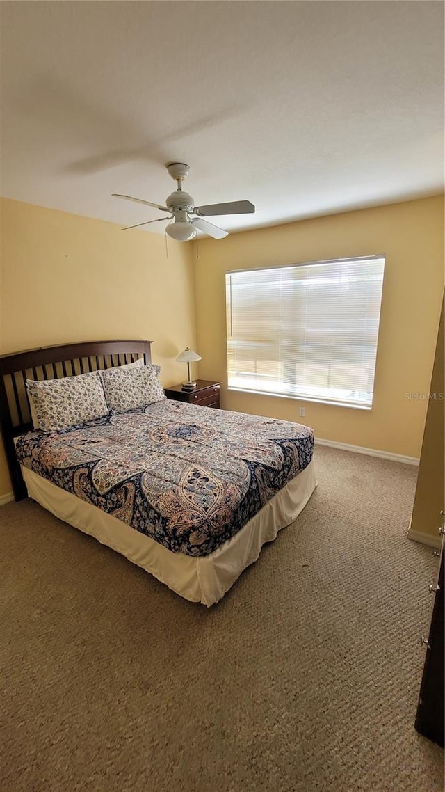 bedroom featuring carpet flooring and ceiling fan