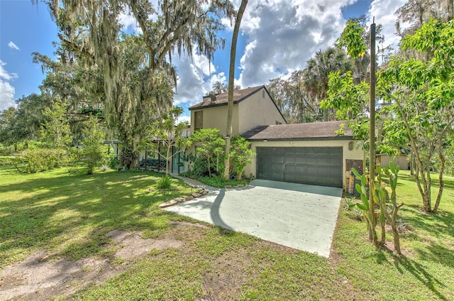 view of yard with a garage