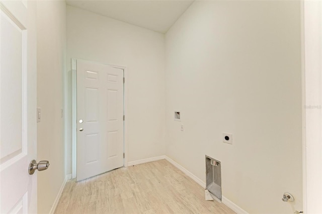 laundry area with light hardwood / wood-style flooring, electric dryer hookup, and washer hookup