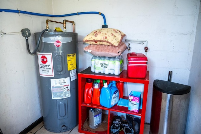 utility room featuring electric water heater