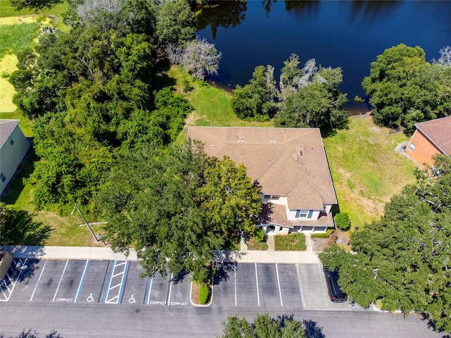 birds eye view of property featuring a water view