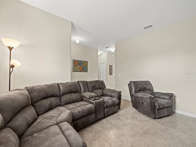 living room featuring light tile patterned flooring