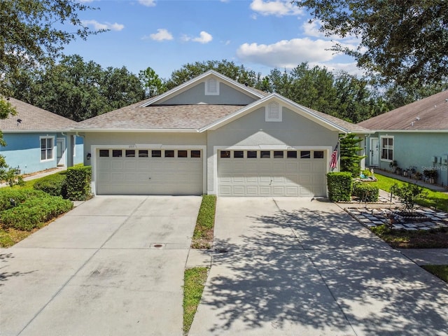 ranch-style house featuring a garage