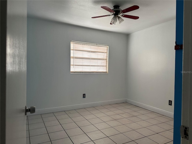 unfurnished room featuring ceiling fan and light tile patterned floors