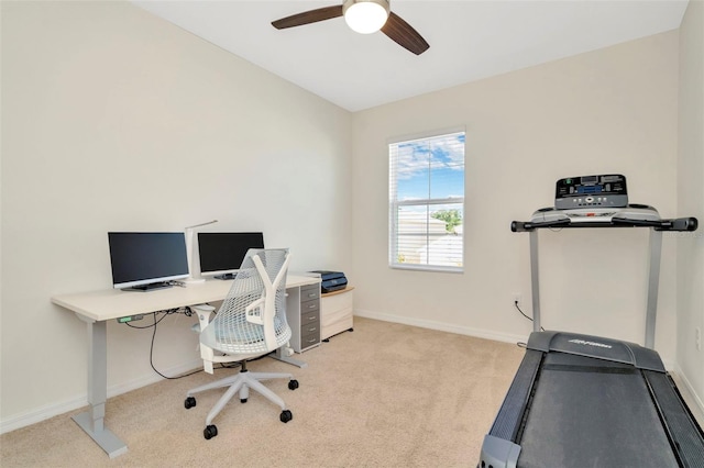 office space with ceiling fan and light colored carpet