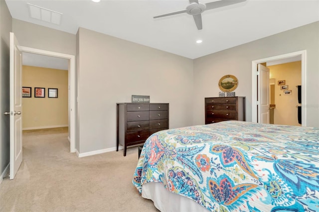 bedroom with ceiling fan and light colored carpet