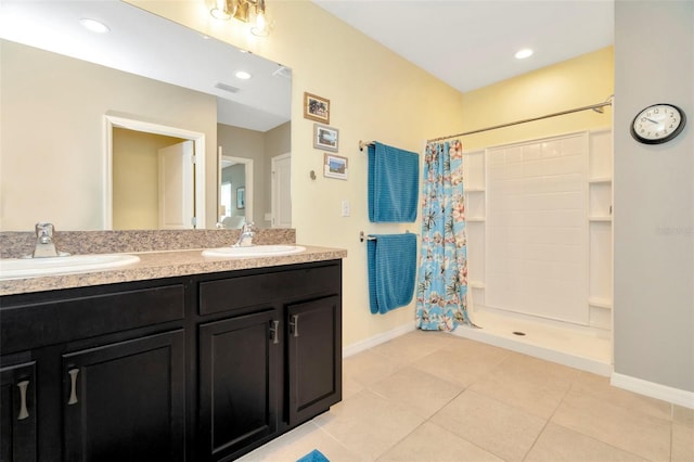 bathroom featuring tile patterned floors, vanity, and a shower with shower curtain