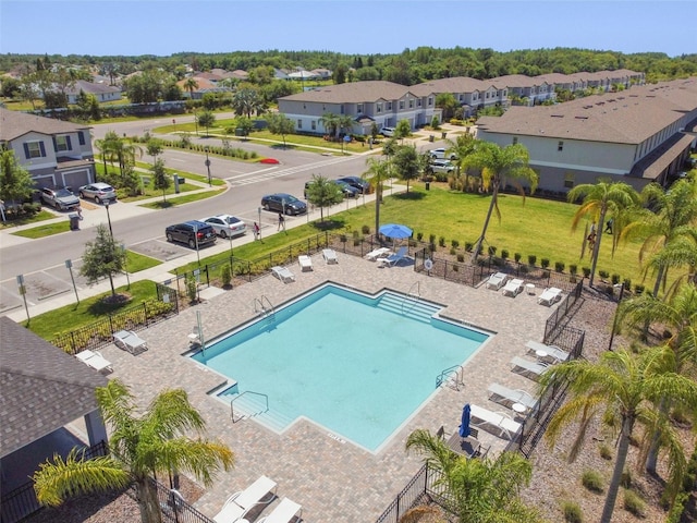 view of swimming pool with a patio area