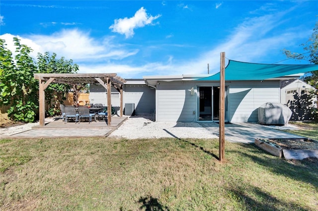 back of house featuring a yard, a pergola, cooling unit, and a patio area