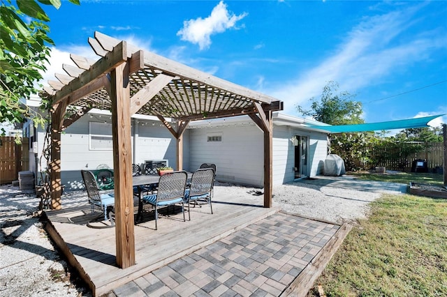 view of patio featuring a pergola and a deck