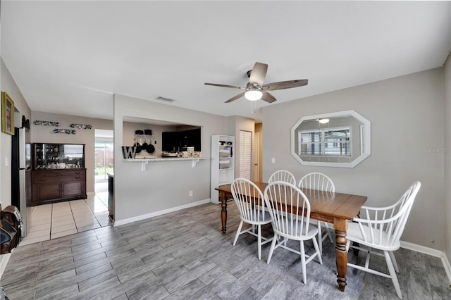 dining area featuring ceiling fan