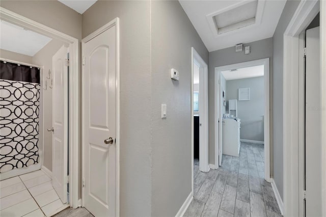 hall featuring light wood-type flooring