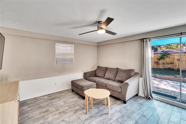 living room featuring ceiling fan