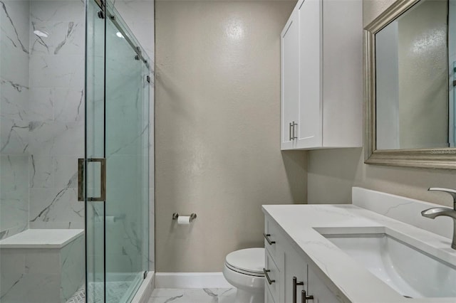 bathroom featuring walk in shower, vanity, and toilet