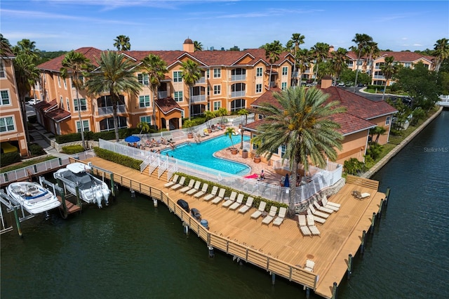 view of pool featuring a water view