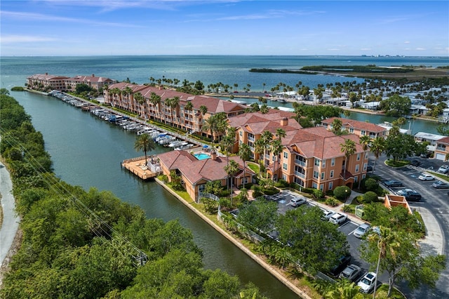 drone / aerial view featuring a water view and a residential view