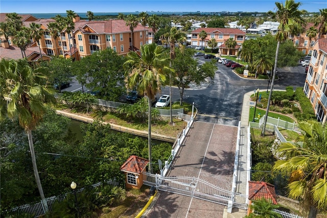 birds eye view of property with a residential view