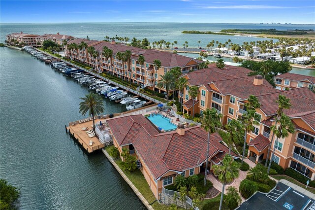 birds eye view of property with a residential view and a water view