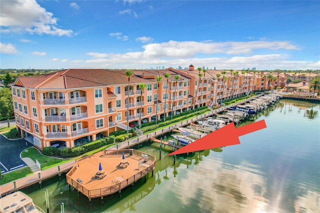 birds eye view of property with a water view