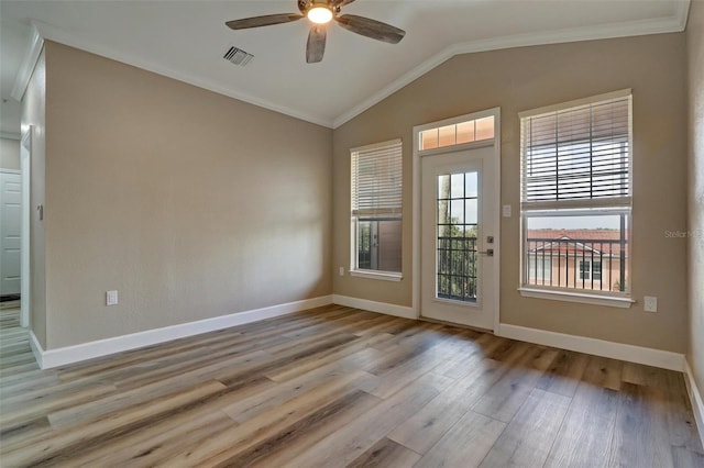 5000 Culbreath Key Way Unit 4-306, Tampa, FL 33611 - spare room with visible vents, ornamental molding, wood finished floors, a ceiling fan, and vaulted ceiling