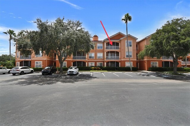5000 Culbreath Key Way Unit 4-306, Tampa, FL 33611 - view of property featuring uncovered parking