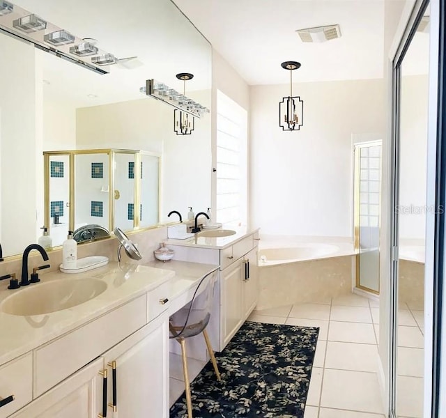 bathroom with vanity, separate shower and tub, and tile patterned floors