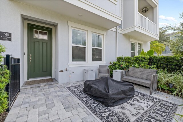 property entrance with a balcony