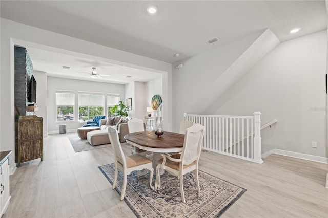 dining area with baseboards, recessed lighting, light wood-style floors, and a ceiling fan
