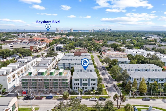 birds eye view of property with a view of city
