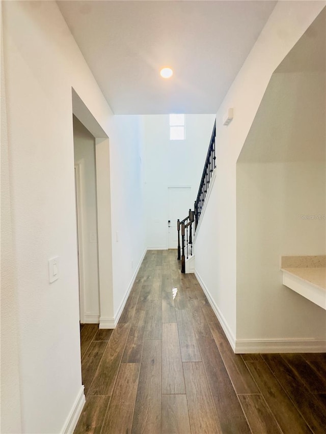 hall featuring dark hardwood / wood-style floors