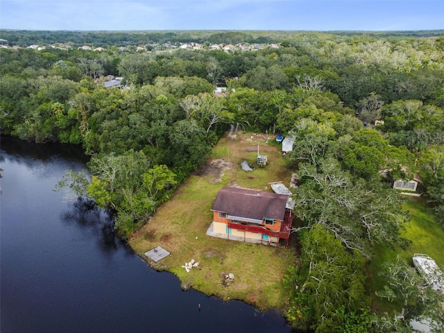 aerial view with a view of trees and a water view