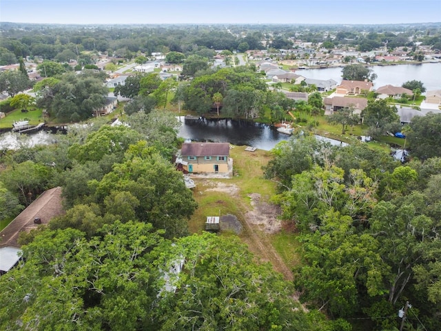 bird's eye view featuring a residential view and a water view