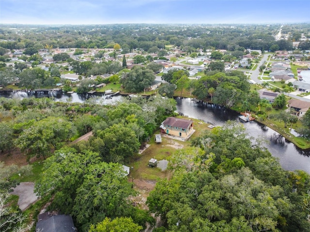 bird's eye view featuring a residential view and a water view