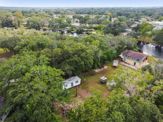 aerial view with a view of trees and a water view