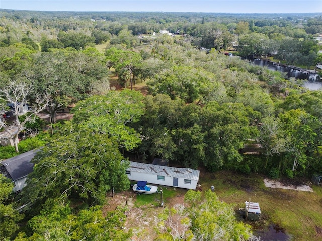 aerial view with a view of trees and a water view