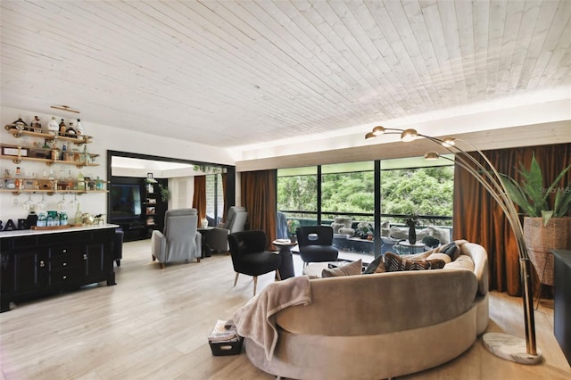 living room with wooden ceiling, light hardwood / wood-style flooring, and indoor bar