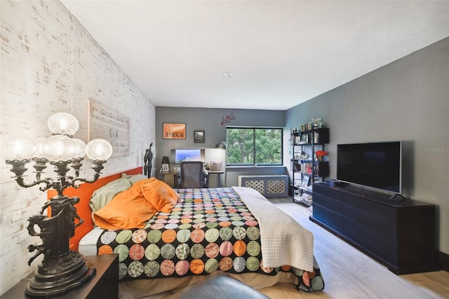 bedroom featuring hardwood / wood-style floors