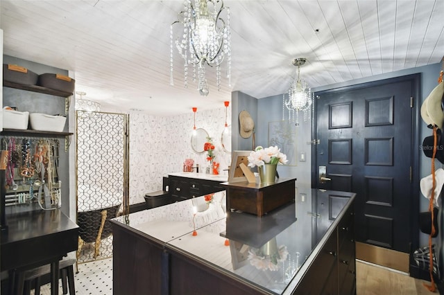 kitchen featuring an inviting chandelier