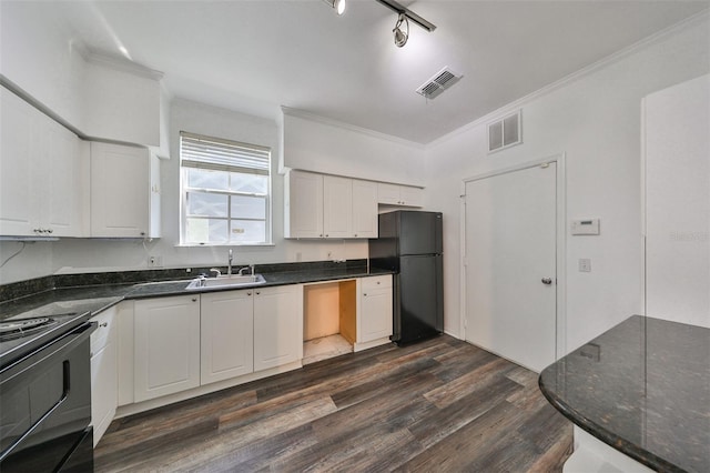 kitchen with black appliances, dark wood-type flooring, ornamental molding, sink, and white cabinetry