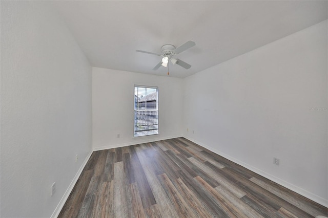 unfurnished room featuring ceiling fan and dark hardwood / wood-style floors