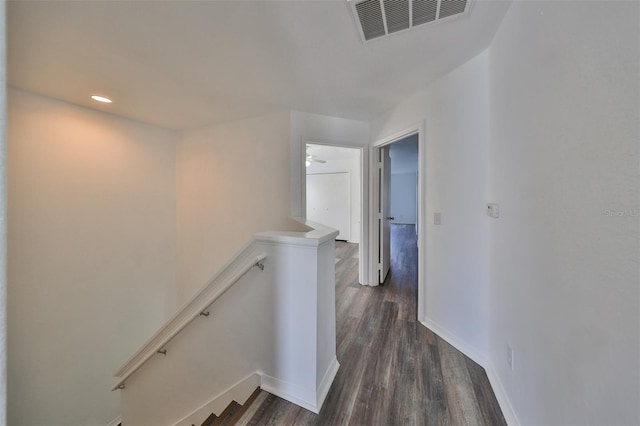 hallway featuring dark wood-type flooring